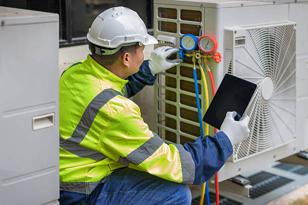 Professional Heat Pump Repair technician working in Oostburg, WI